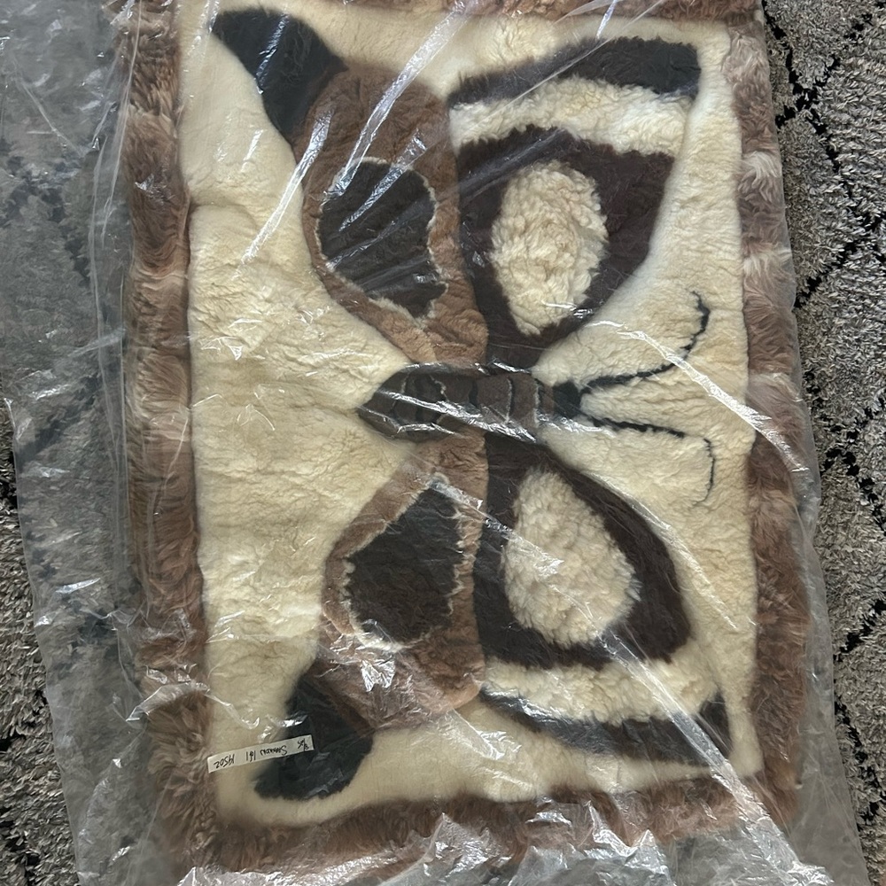 Faux fur butterfly rug 3 ft by 5ft.